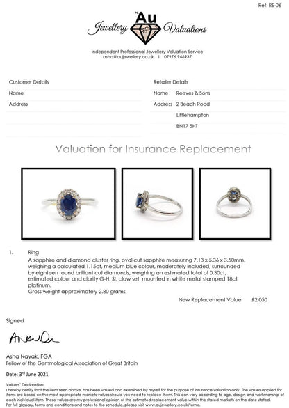 Elegant 18ct white gold sapphire and diamond ring showcasing a central blue sapphire surrounded by sparkling diamonds.