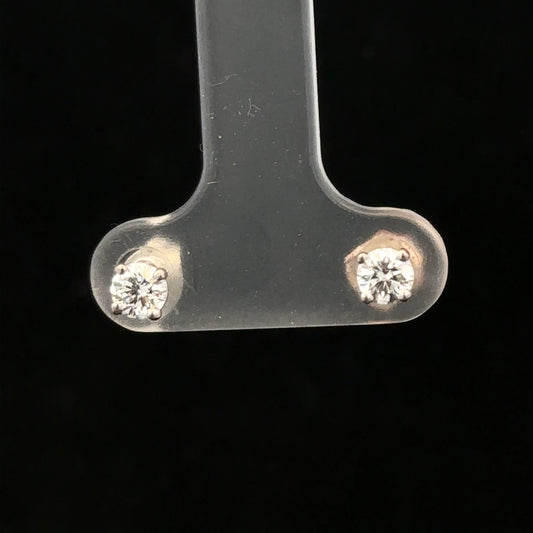 18ct white gold diamond stud earrings with 0.40 carat diamonds, featuring a classic and elegant jewelry design.