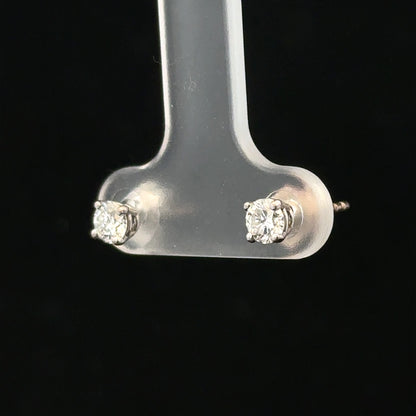 18ct white gold diamond stud earrings with 0.40 carat total weight featuring sparkling diamonds and a classic design.