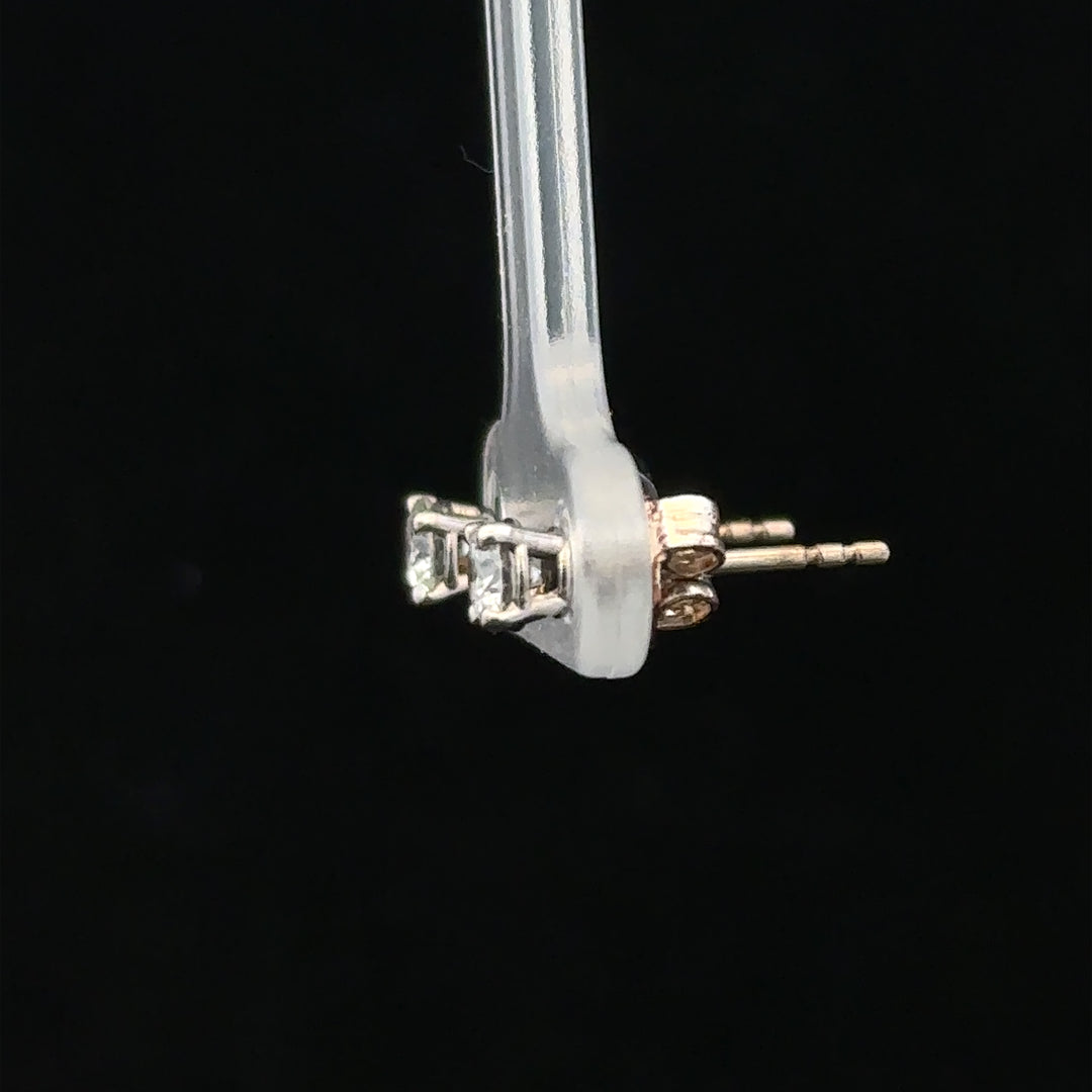 18ct white gold stud earrings with 0.40 carat diamonds, featuring classic round-cut diamond design.