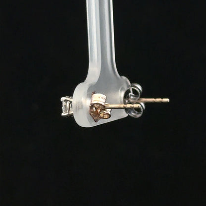 18ct white gold diamond stud earrings with 0.40 carat diamonds, featuring classic, elegant jewelry design.