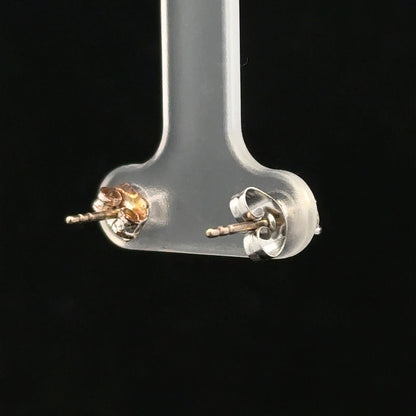 18ct white gold diamond stud earrings with 0.40 carat total weight, featuring sparkling round diamonds on a classic setting.