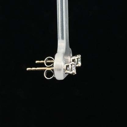 18ct white gold stud earrings with 0.40 carat diamond, showcasing elegant and sparkling jewelry design.