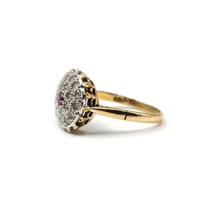 18ct yellow gold ruby and diamond cluster ring, size Q, featuring 0.15 carat ruby and 0.60 carat diamonds.