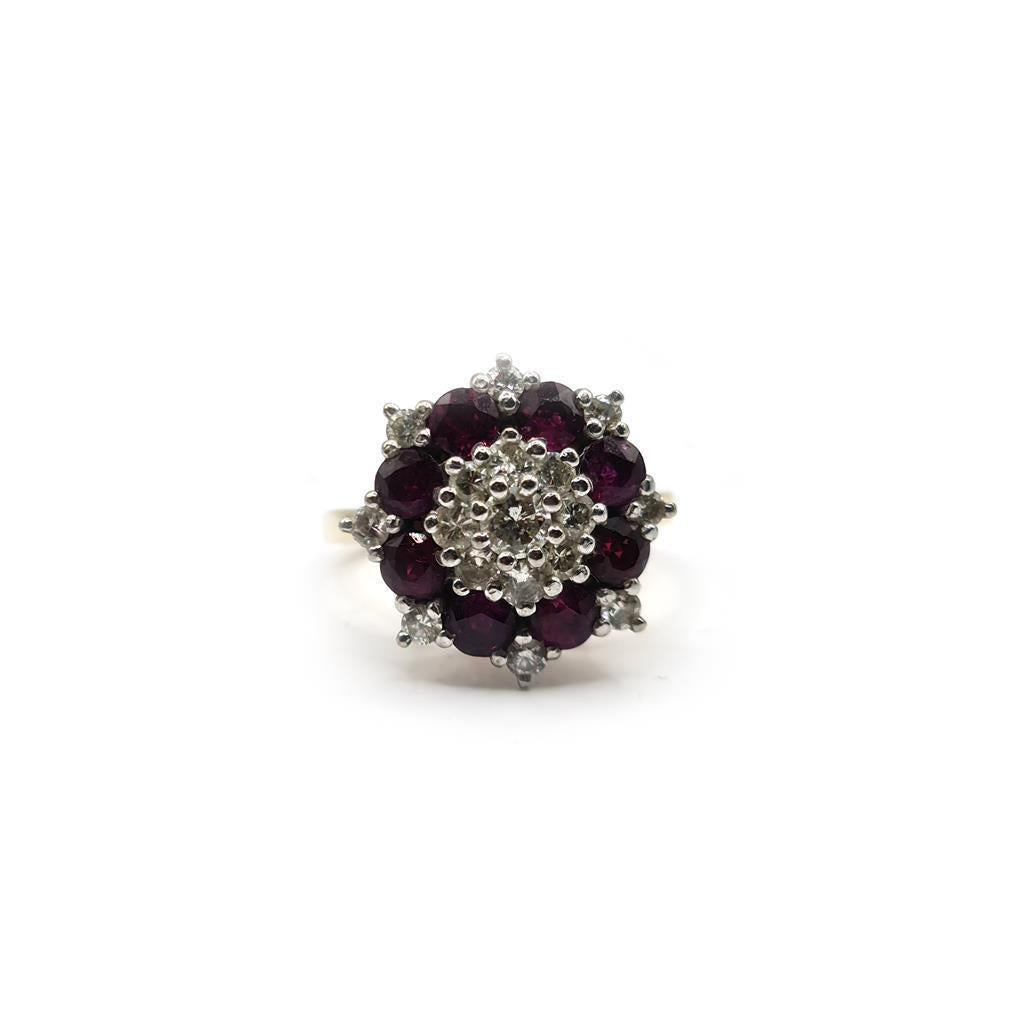 18ct yellow gold ring with 0.25ct ruby and 0.90ct diamond, showcasing a elegant gemstone design and polished finish.
