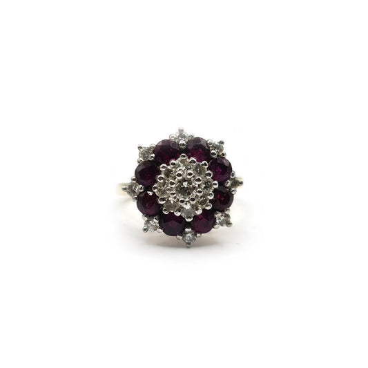 18ct yellow gold ring with 0.25ct ruby and 0.90ct diamond, showcasing a elegant gemstone design and polished finish.