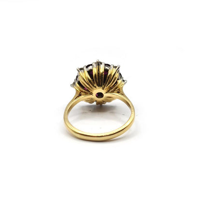 18ct yellow gold ring featuring a 0.25 carat ruby and 0.90 carat diamond, elegant jewelry with vibrant gemstones.