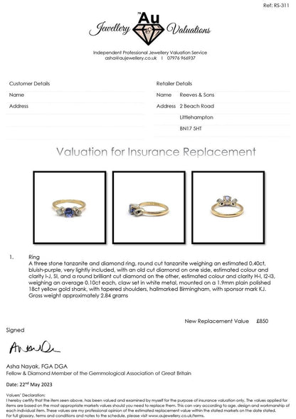 18ct yellow gold tanzanite and diamond ring with 0.40 carat tanzanite and 0.20 carat diamonds, elegant jewelry piece.