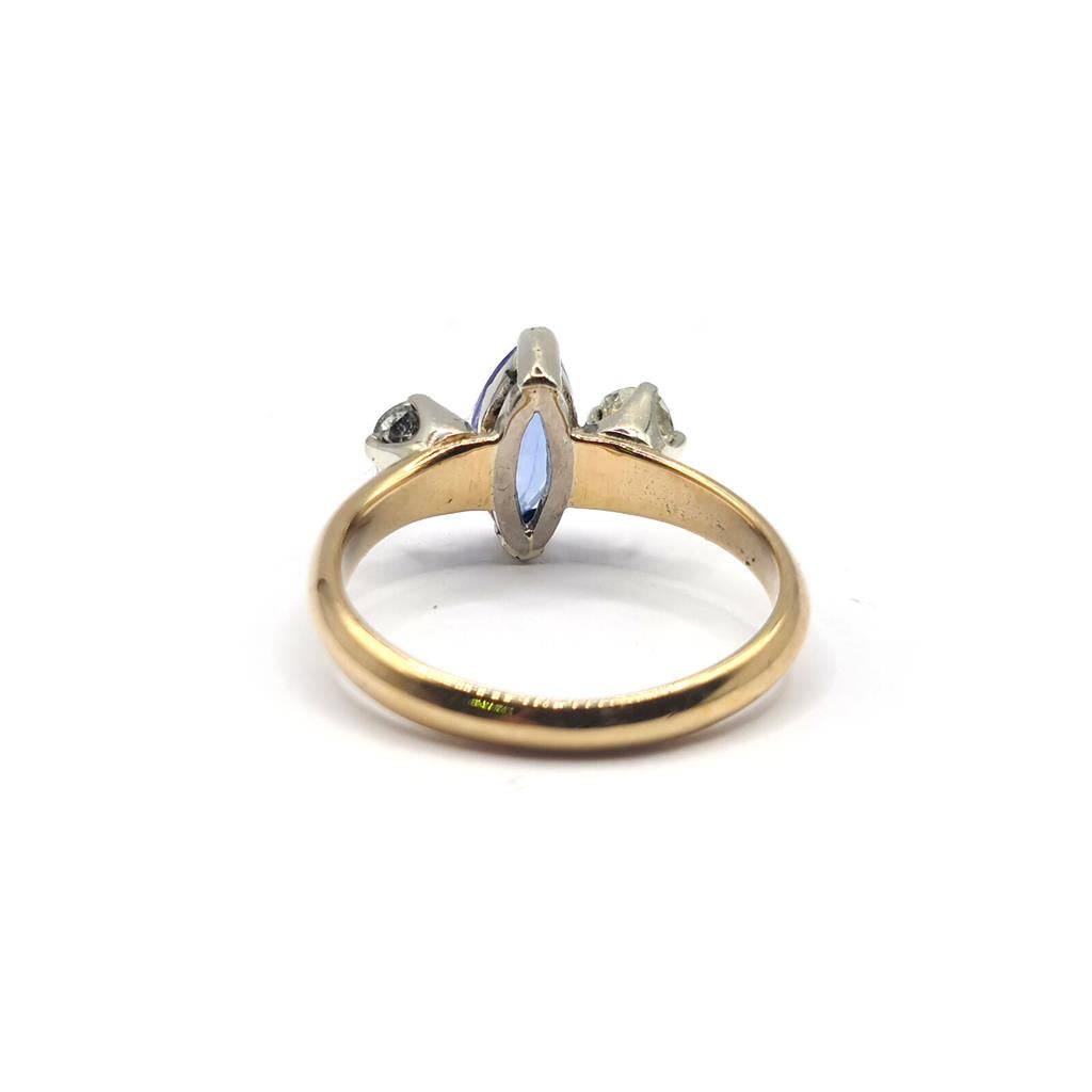 18ct yellow gold ring with a 0.50 carat tanzanite and 0.30 carat diamond accents, featuring a sleek, elegant design.