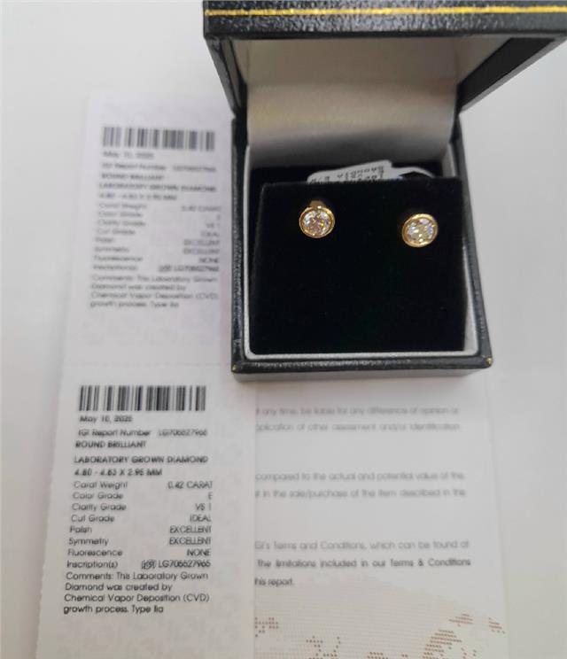 18ct yellow gold lab diamond earrings with 0.84ct total weight, colour E, VS1 clarity, IGI certification, unbranded.