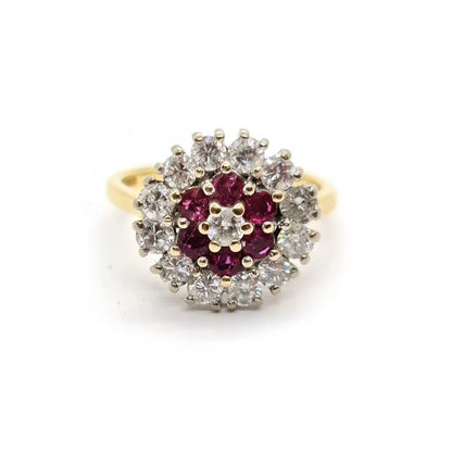 18ct yellow gold ring with 1.18ct diamonds and 0.36ct rubies, size K, featuring a classic design.