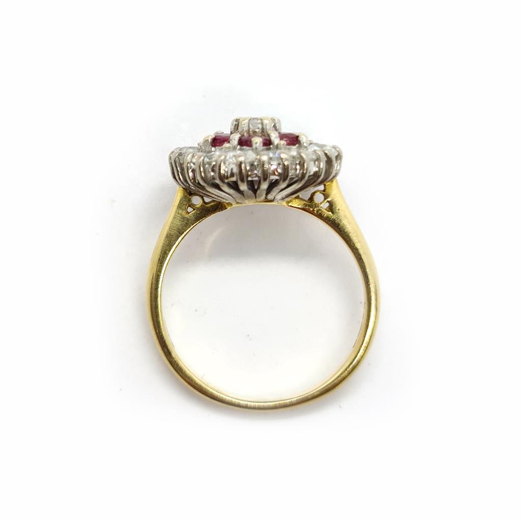 18ct yellow gold ring with 1.18ct diamond and 0.36ct ruby, size K, featuring elegant gemstone accents and gold band.