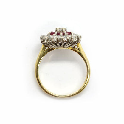 18ct yellow gold ring with 1.18ct diamond and 0.36ct ruby, size K, featuring elegant gemstone accents and gold band.