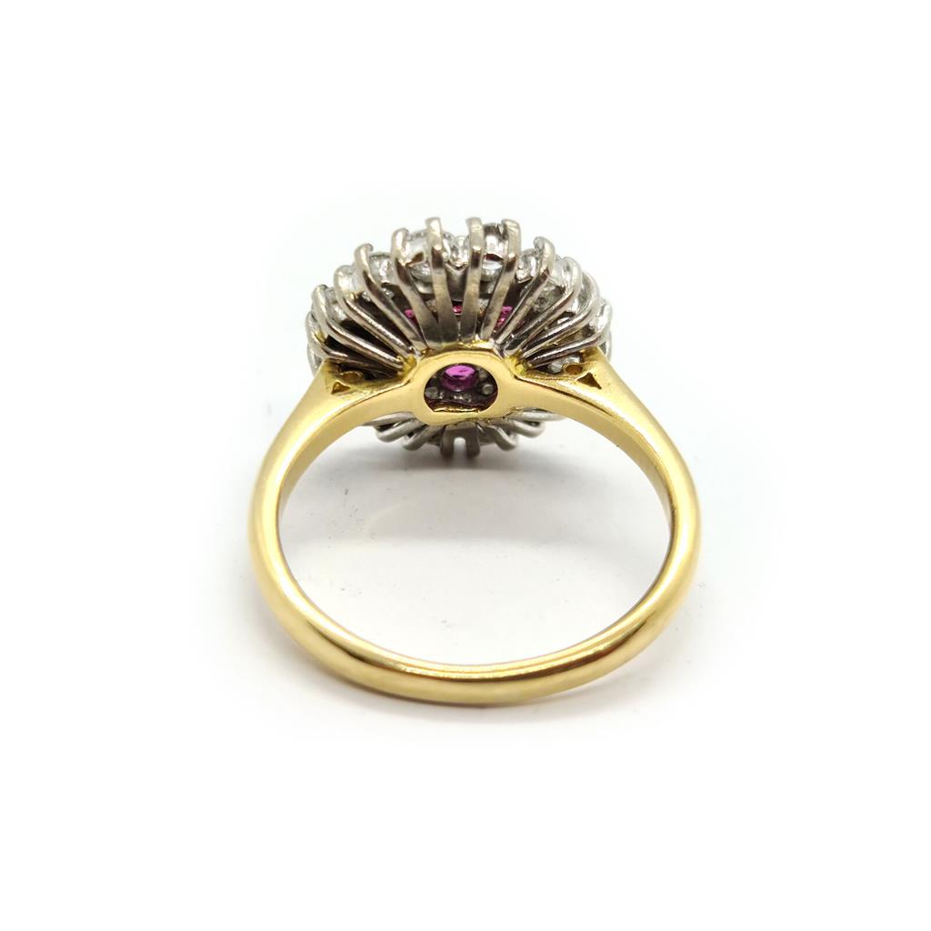18ct yellow gold ring featuring 1.18ct diamond and 0.36ct ruby, size K, showcasing elegant gemstone details.