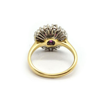 18ct yellow gold ring featuring 1.18ct diamond and 0.36ct ruby, size K, showcasing elegant gemstone details.