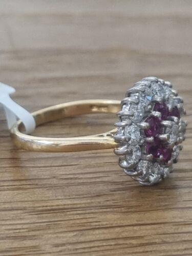 18ct yellow gold ring with 1.18ct diamond and 0.36ct ruby, size K, featuring a elegant design and vibrant gemstone accents.