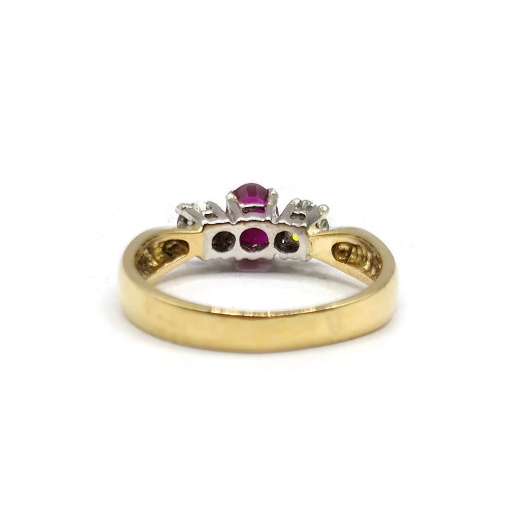 18ct yellow gold ring featuring a 1/2 carat ruby and 0.30 carat diamond, elegant jewelry with vibrant gemstones.
