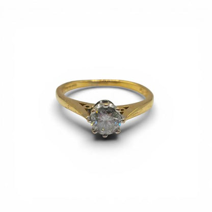 18ct yellow gold diamond ring with 1/2 carat total weight featuring a sparkling central diamond and elegant band design.