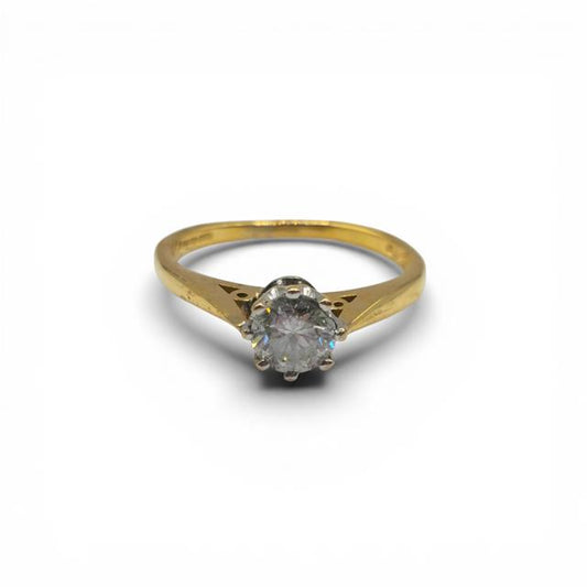 18ct yellow gold diamond ring with 1/2 carat total weight featuring a sparkling central diamond and elegant band design.