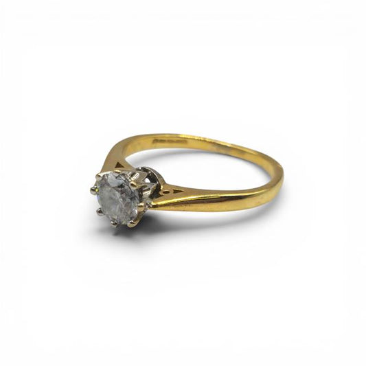 18ct yellow gold diamond ring with 1/2 carat total weight, featuring sparkling diamonds and a sleek, elegant design.