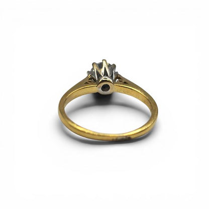 18ct yellow gold diamond ring with 1/2 carat total weight, featuring sparkling diamonds set in a classic design.