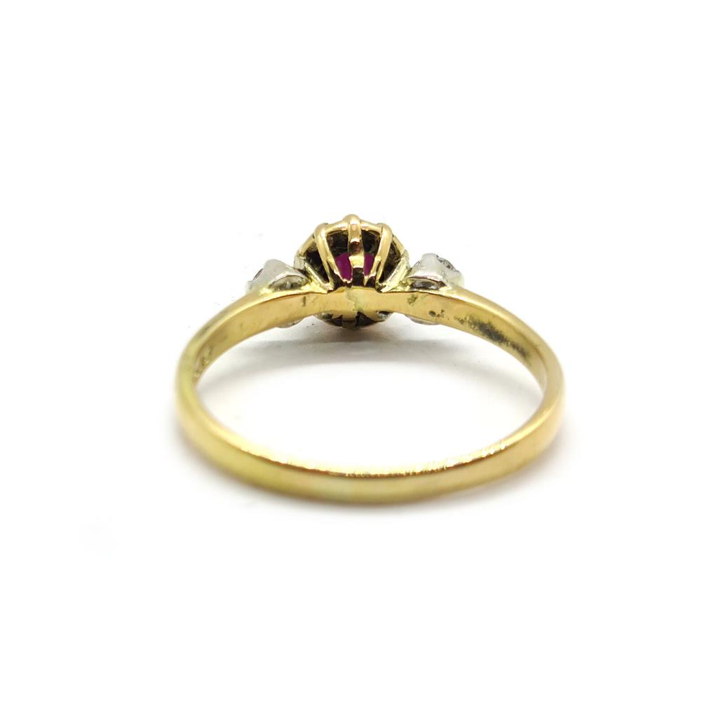 18ct yellow gold ring with a 1.45 carat garnet centerpiece and 0.30 carat diamonds, elegant unbranded jewelry design.