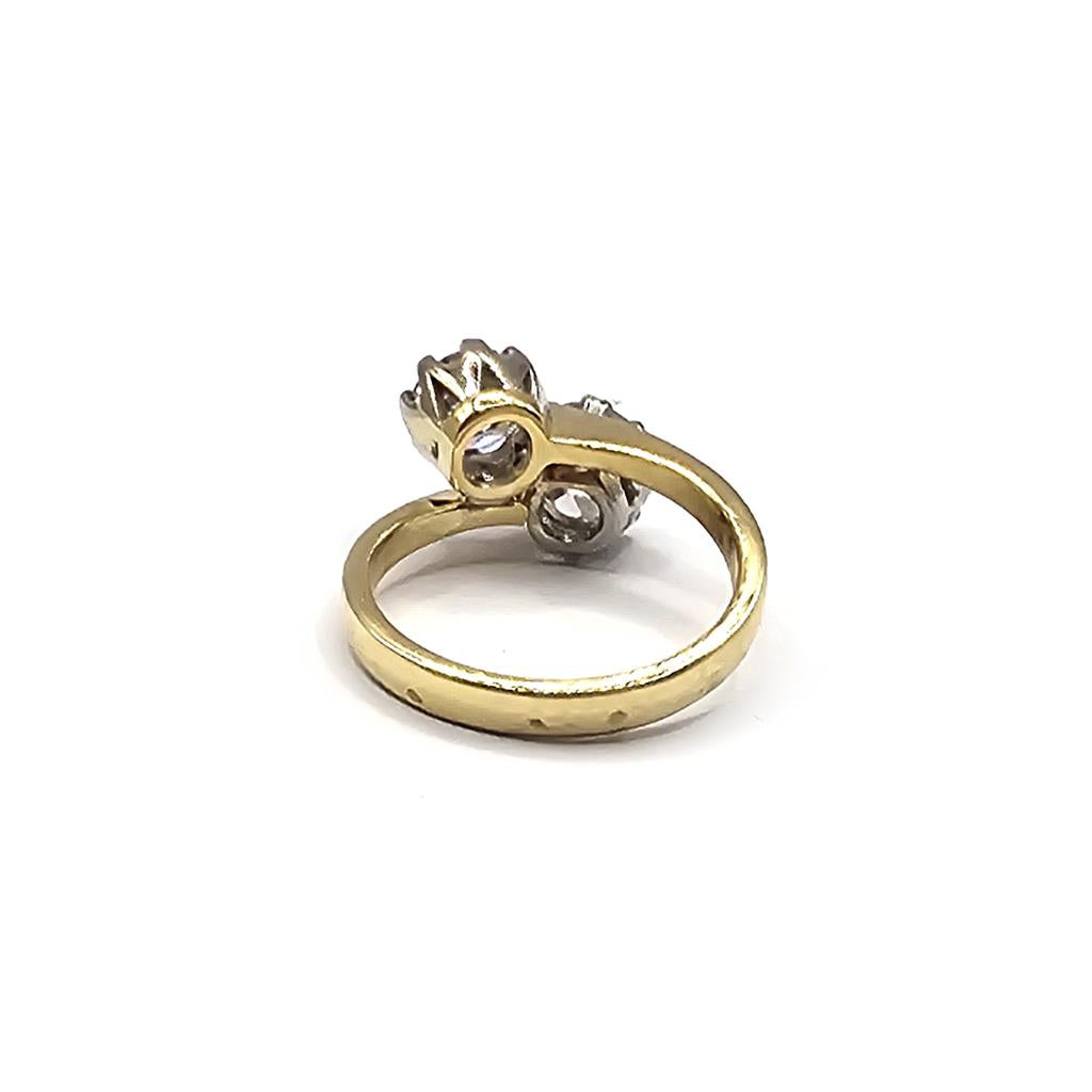 18ct yellow gold 1.70 carat diamond two-stone crossover ring, size I, with elegant design and sparkling diamonds.