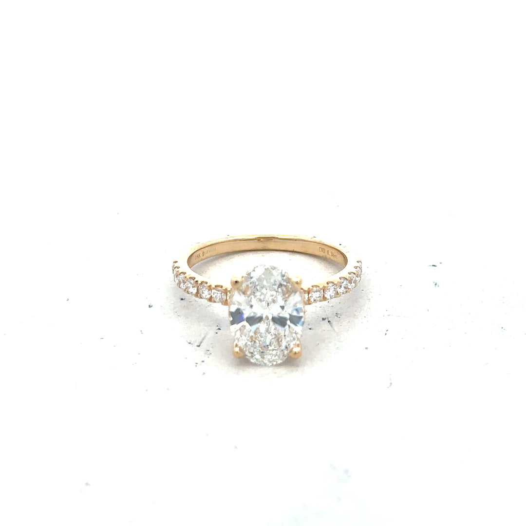 18ct yellow gold diamond ring with 2.1ct VS1 F lab-grown diamond, size M, featuring a sparkling central gemstone and intricate band details.