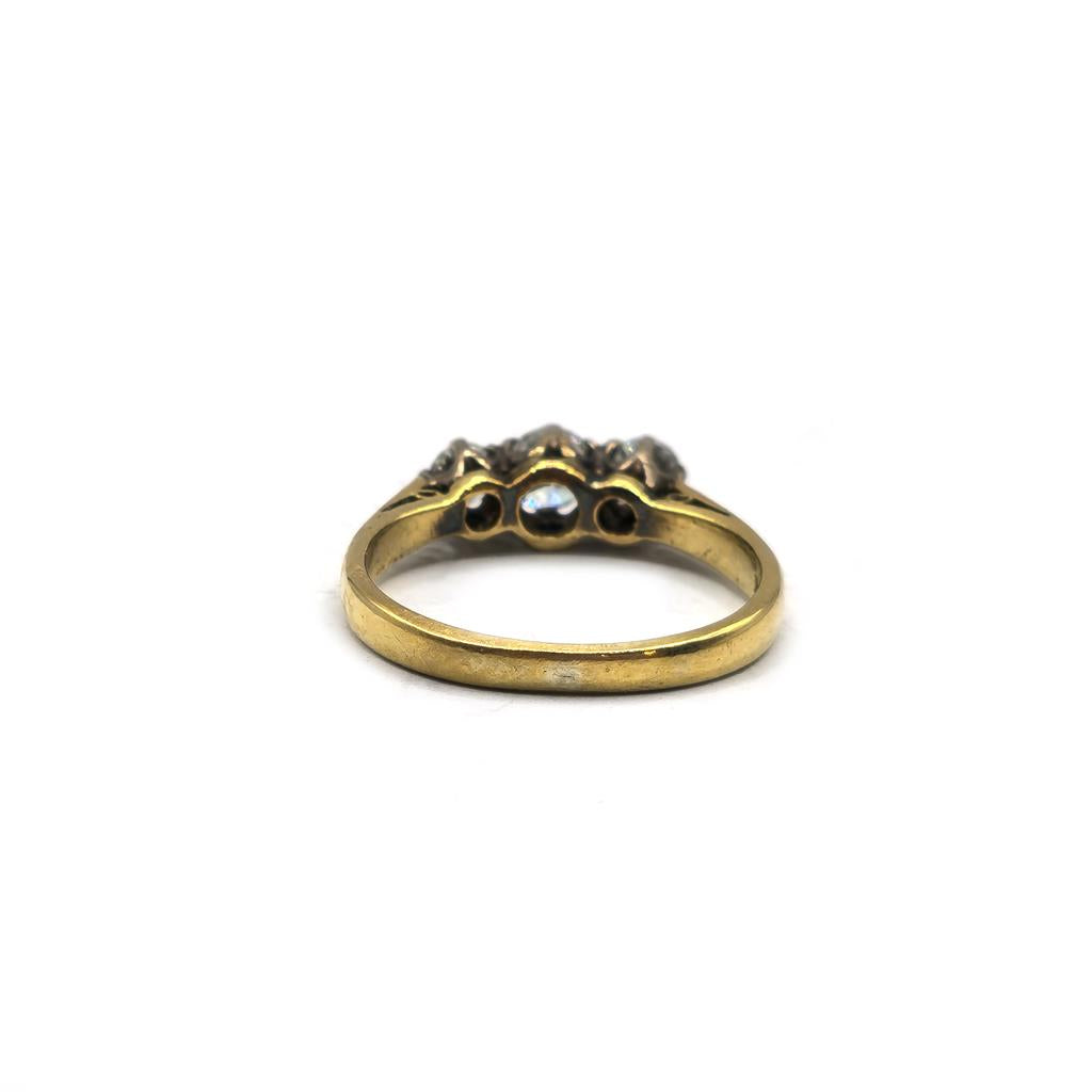 18ct yellow gold ring with three diamonds, size K, featuring a classic and elegant design.