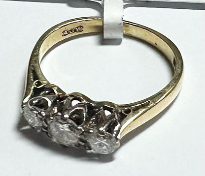 18ct yellow gold 3 diamond ring in size K, featuring a classic design and sparkling diamonds on a polished band.