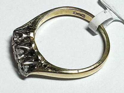 18ct yellow gold ring with three diamonds in size K, featuring elegant craftsmanship and classic design.
