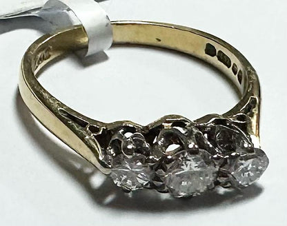 18ct yellow gold ring with three diamonds in size K, featuring a sleek and elegant design.