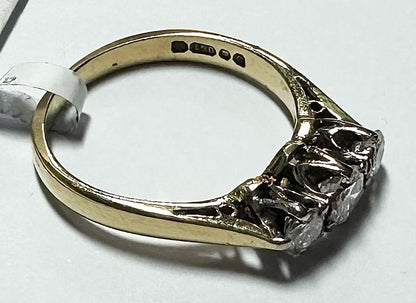 18ct yellow gold ring with three diamonds, size K, featuring a sleek and elegant design.