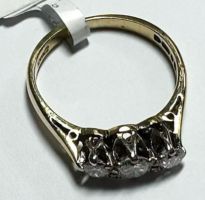 18ct yellow gold 3 diamond ring in size K, showcasing a sleek design with sparkling diamonds set on a yellow gold band.