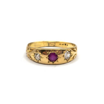 18ct yellow gold antique ruby and diamond ring with intricate detailing, featuring a central ruby and sparkling diamonds.