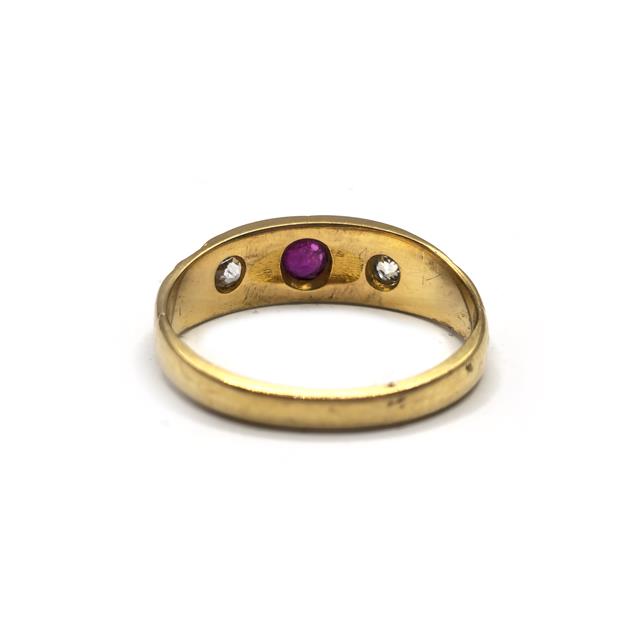 18ct yellow gold antique ruby and diamond ring featuring a detailed design and sparkling gemstones.