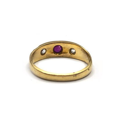18ct yellow gold antique ruby and diamond ring featuring a detailed design and sparkling gemstones.