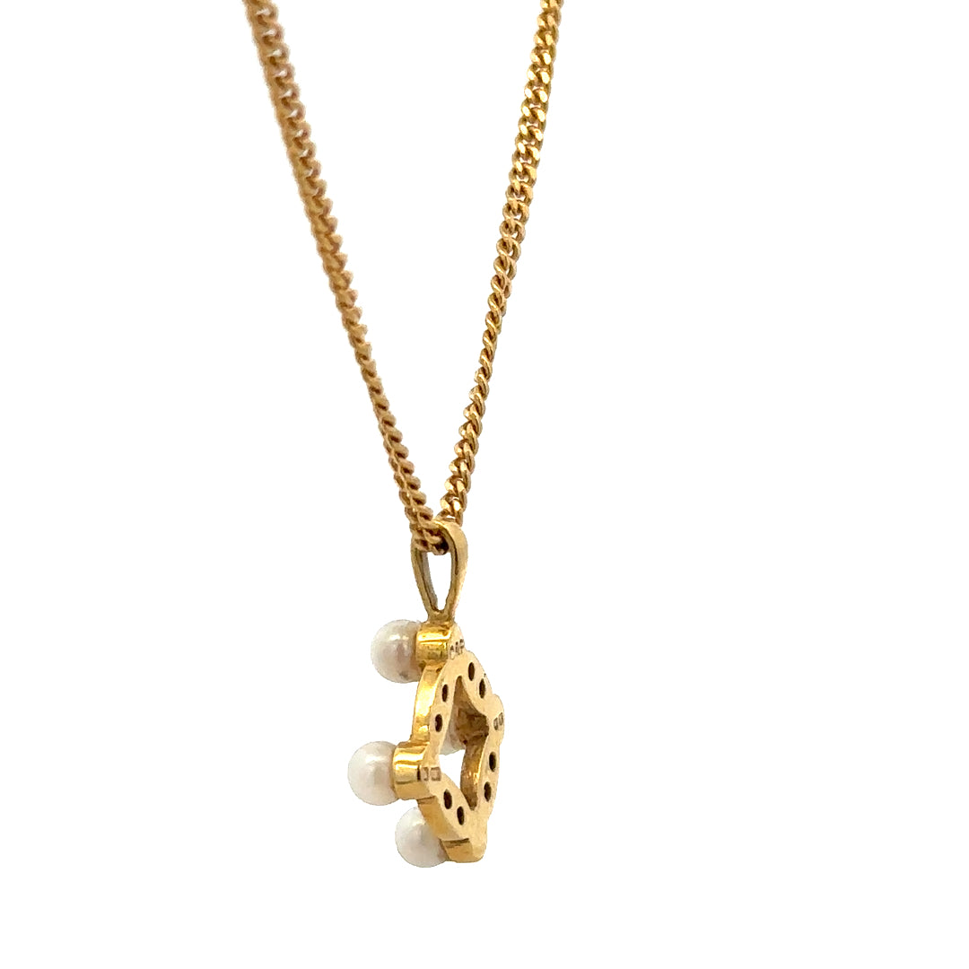 18ct yellow gold chain with pendant, unbranded, weighing 4.3g, shown with close-up of the chain and pendant details