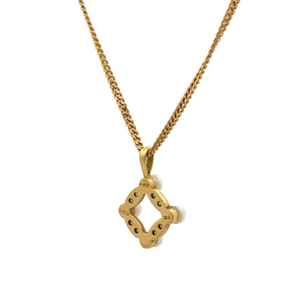 18ct yellow gold chain with pendant, weighing 4.3g, showcasing a classic jewelry design with detailed craftsmanship.