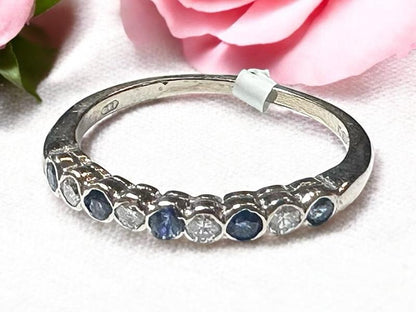 18ct yellow gold diamond and sapphire ring, size M, featuring sparkling gemstones and an elegant design.