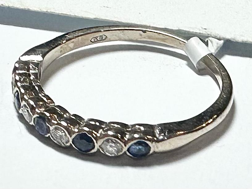 18ct yellow gold diamond and sapphire ring in size M, featuring sparkling gemstones and elegant design.