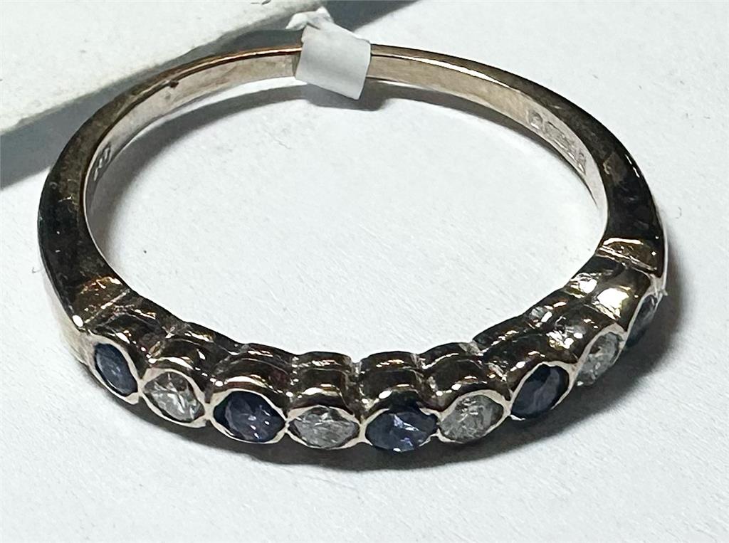 18ct yellow gold diamond and sapphire ring in size M, featuring a detailed design with sparkling gemstones and a polished finish.