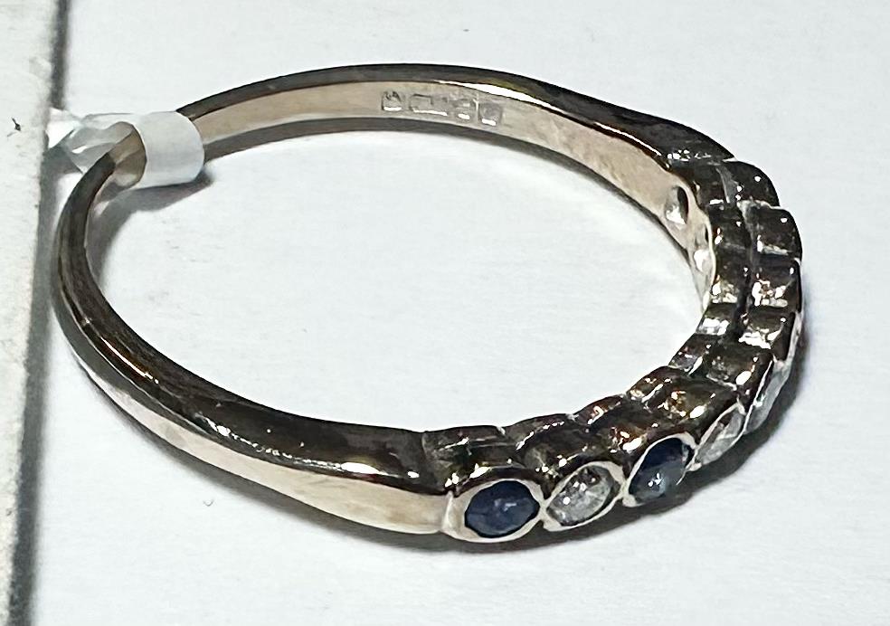 18ct yellow gold diamond and sapphire ring, size M, featuring sparkling gemstones and elegant design.