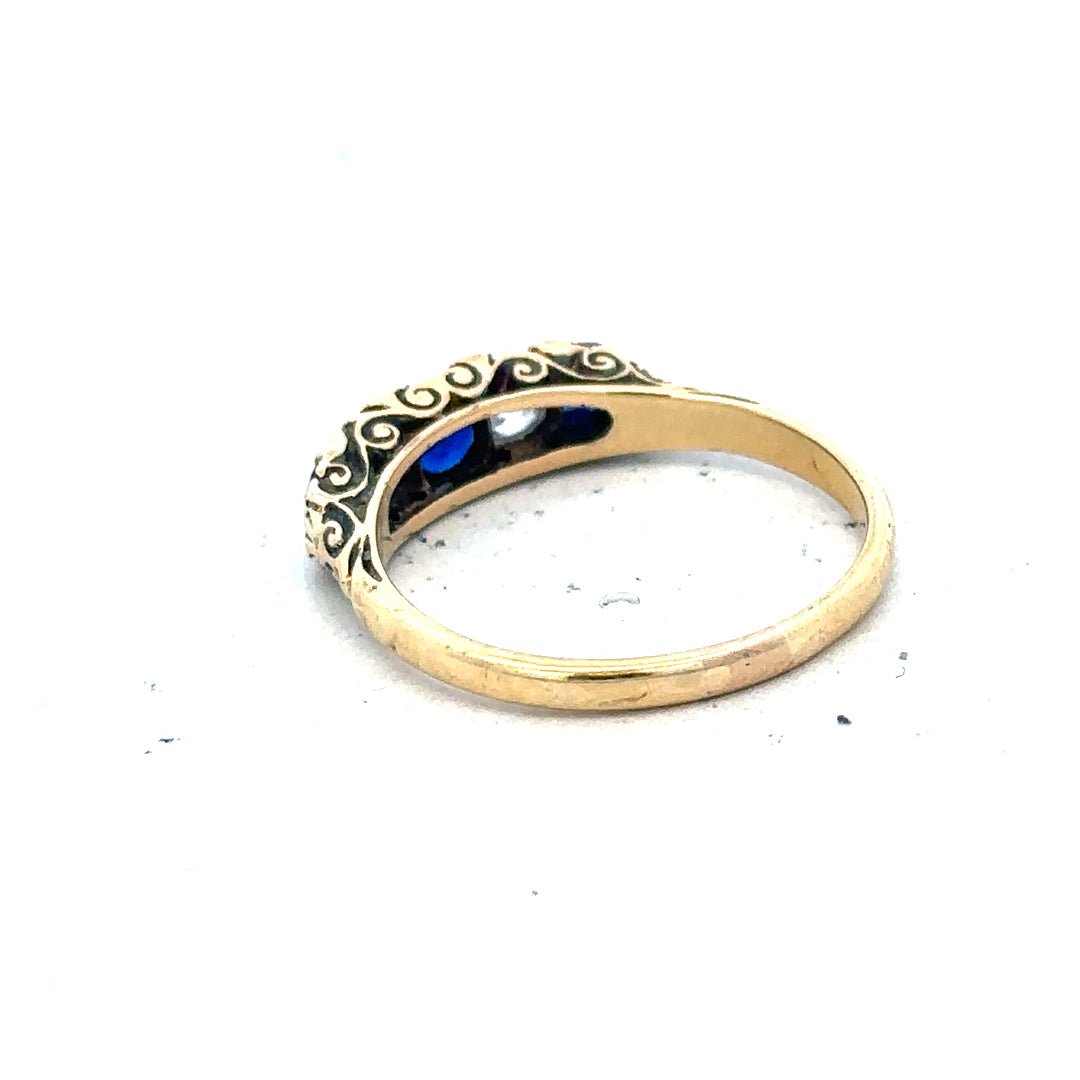 18ct yellow gold diamond and sapphire ring in size O 1/2, featuring sparkling gemstones and elegant craftsmanship.