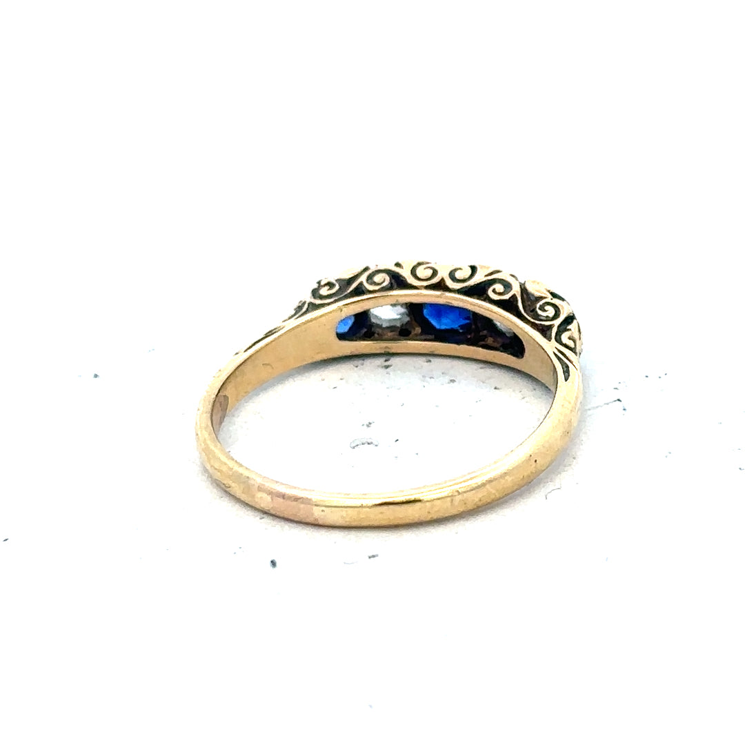 18ct yellow gold diamond and sapphire ring, size O 1/2, featuring sparkling gemstones on a stylish gold band.