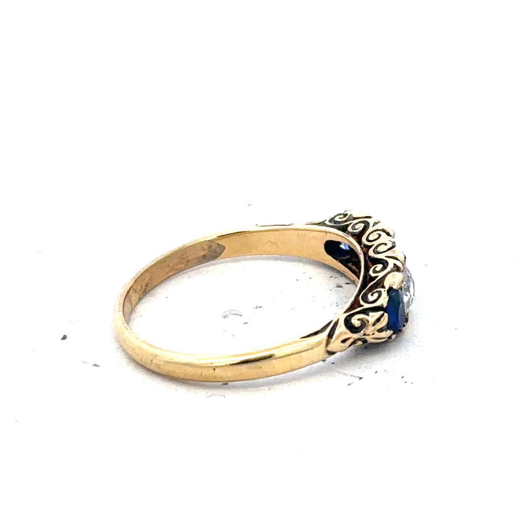 18ct yellow gold diamond and sapphire ring in size O 1/2, featuring sparkling gemstones and elegant design.