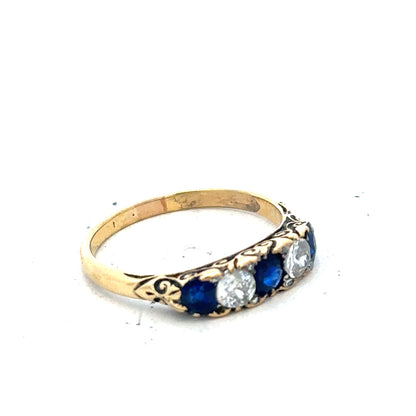 18ct yellow gold diamond and sapphire ring, size O 1/2, with detailed gemstone and band visible in the image.