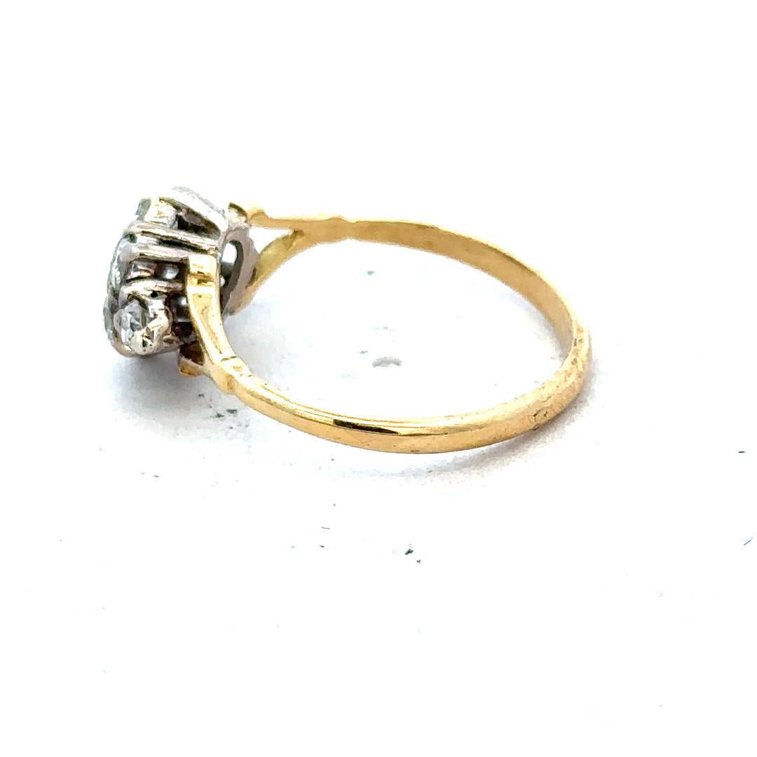 18ct yellow gold diamond cluster ring with multiple sparkling diamonds set in a luxurious gold band.