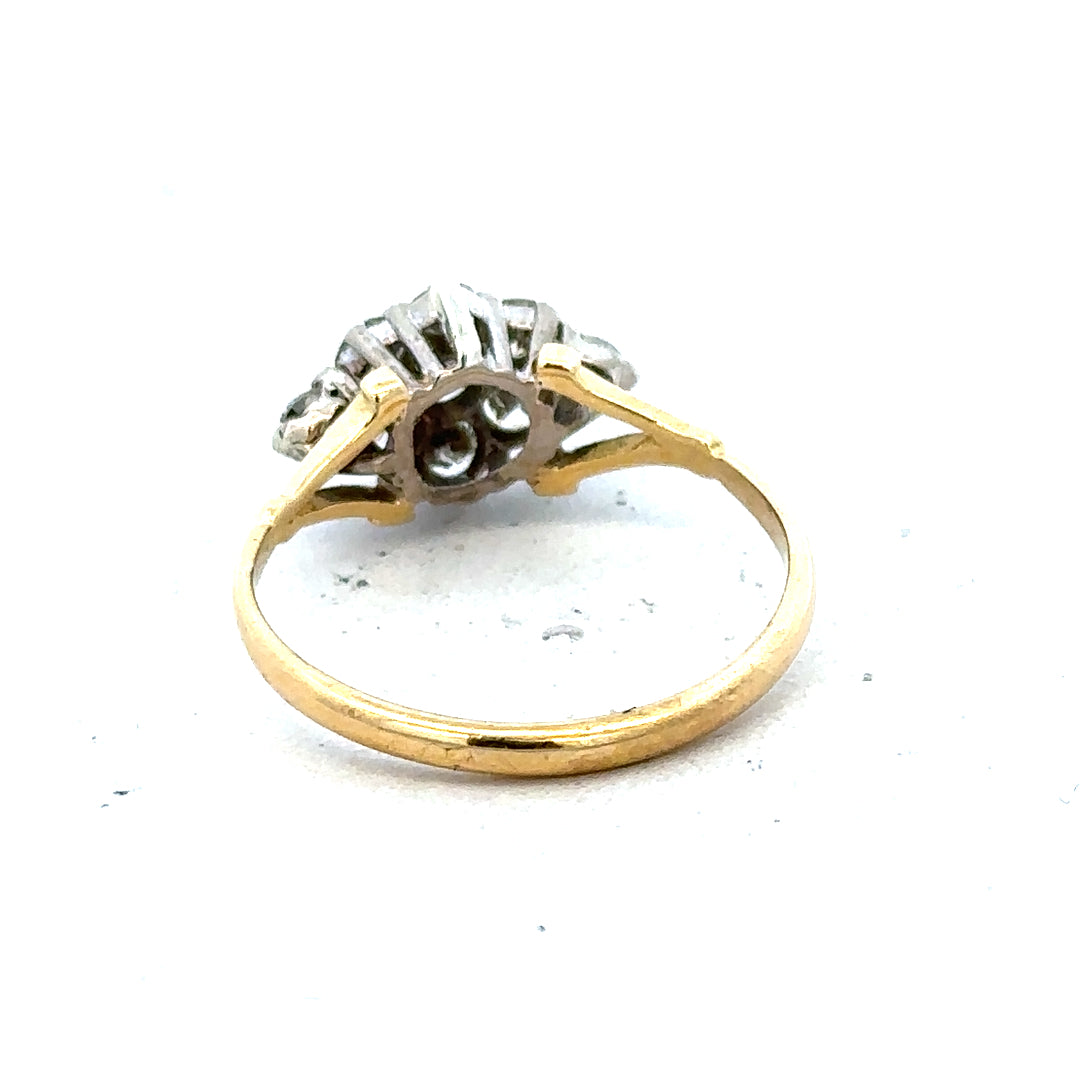 18ct yellow gold diamond cluster ring with multiple sparkling diamonds set in a classic design.
