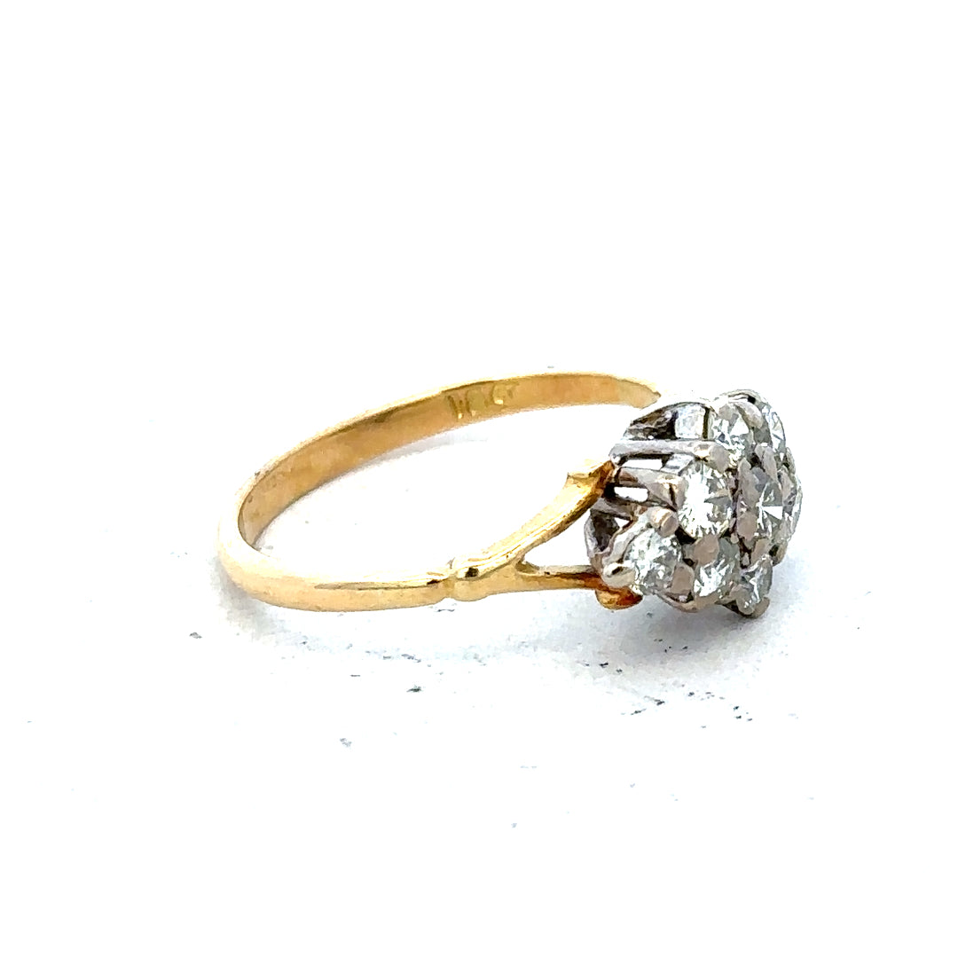18ct yellow gold diamond cluster ring with multiple sparkling diamonds arranged in a elegant design.